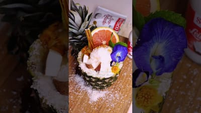 Frozen Piña Colada (Drink Cocktail in Pineapple Shell)