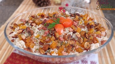 ARROZ ESPECIAL DE FIESTA ADORNADO CON ALMENDRAS, UN TOQUE DE TOCINO Y DAMASCOS